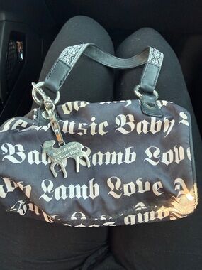 L.A.M.B. Black Shoulder Bag with White Script and Silver Charm